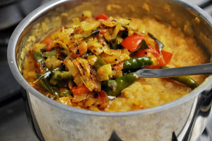 A dhal curry with vegetables! This version is low on tomato paste and curry powder. The redder it becomes, the hotter and more tomato-ey it will be! 