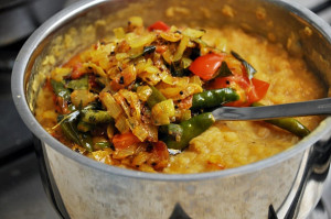 A dhal curry with vegetables! This version is low on tomato paste and curry powder. The redder it becomes, the hotter and more tomato-ey it will be!